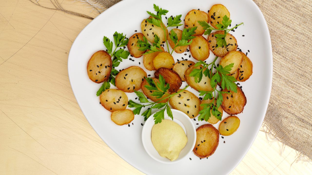 Brasekartofler i andefedt