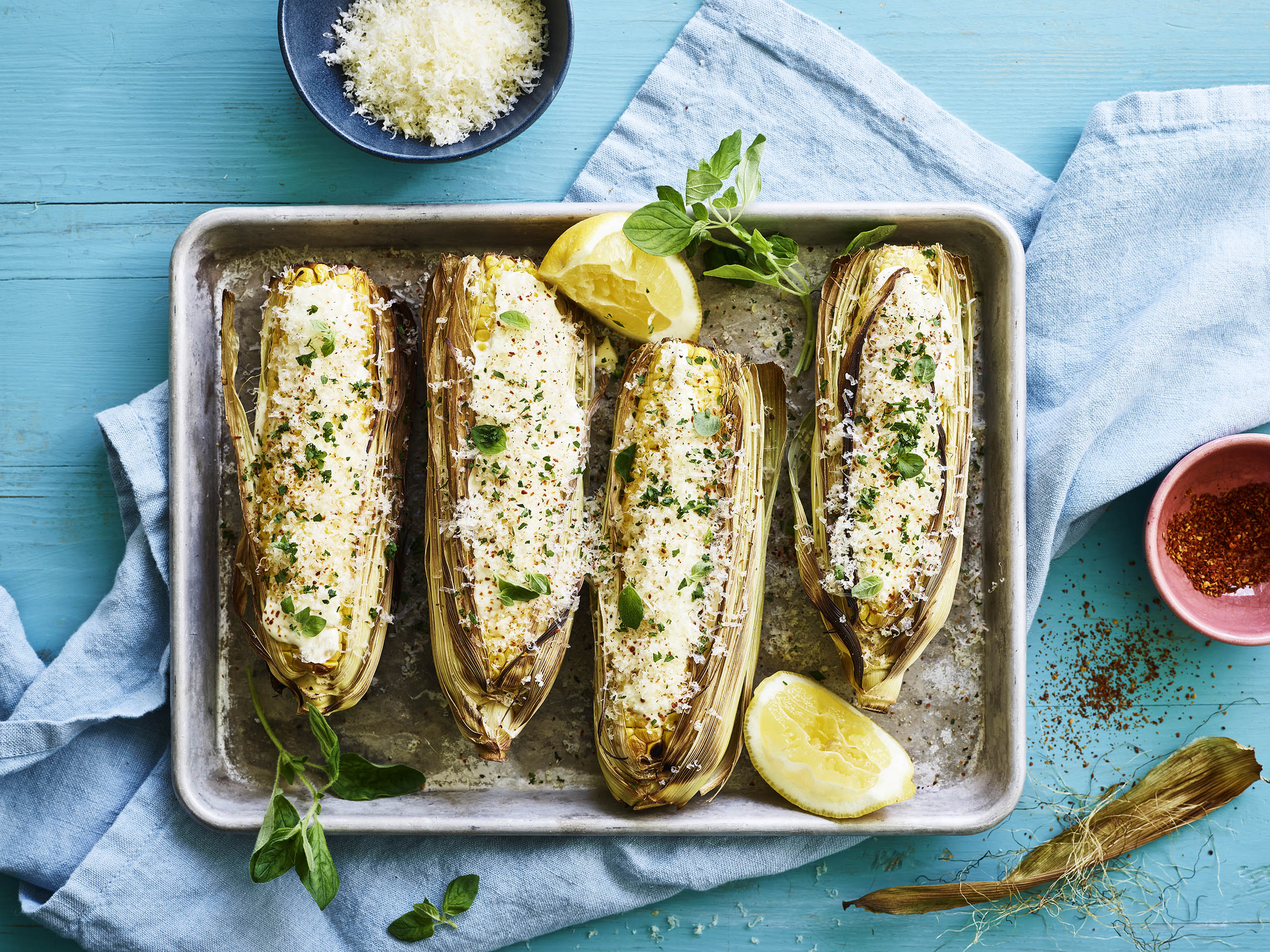 Majs med creme fraiche, ost og lime