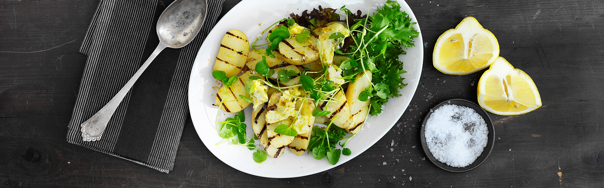 Grillede kartofler med karrysmør og brøndkarse