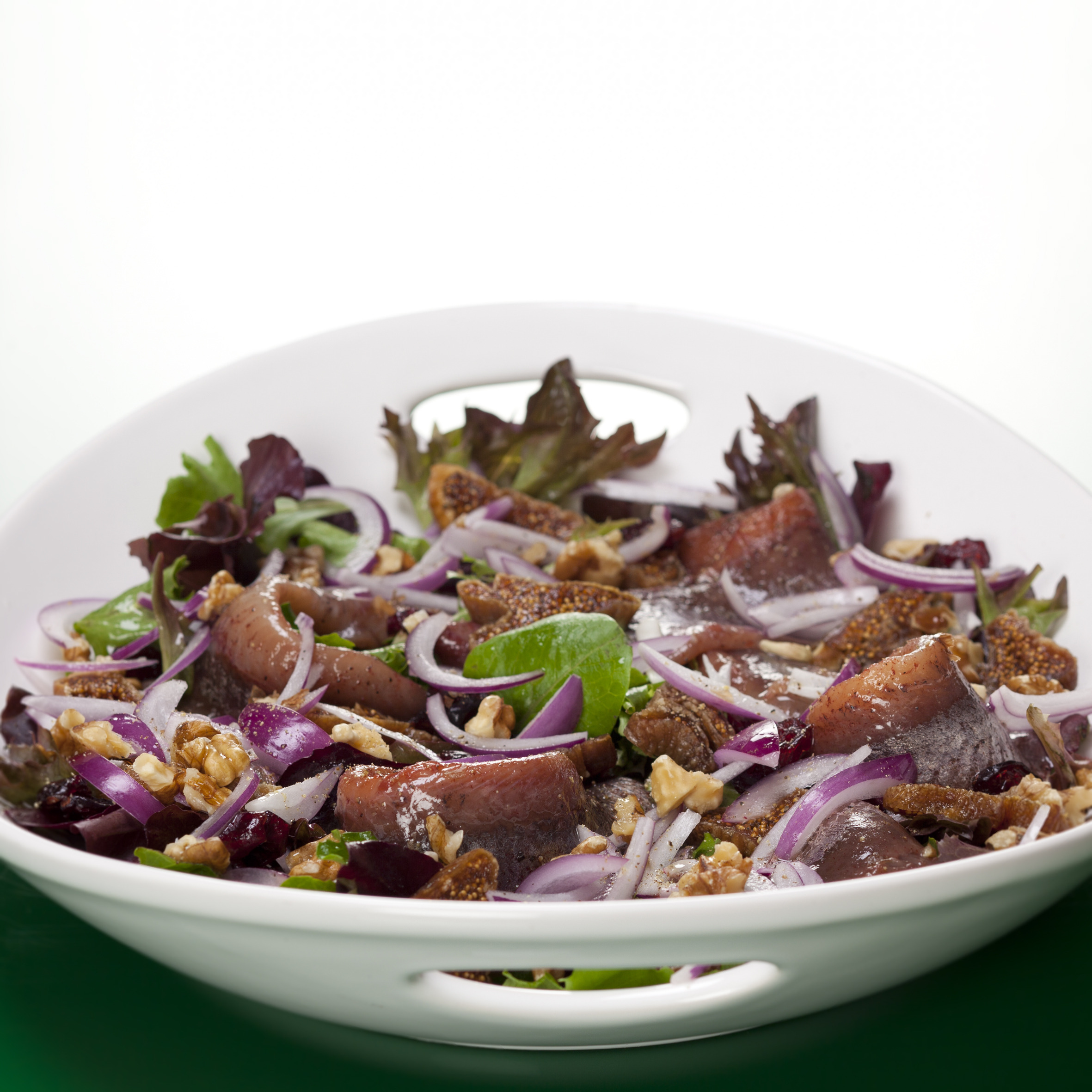 Kryddersild med figner, valnødder og tranebær og løg