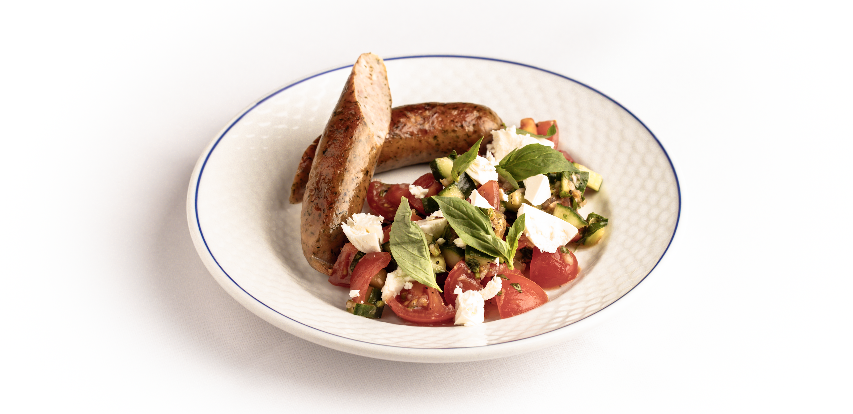 Grillede pølser fra Hanegal med frugtig tomatsalat