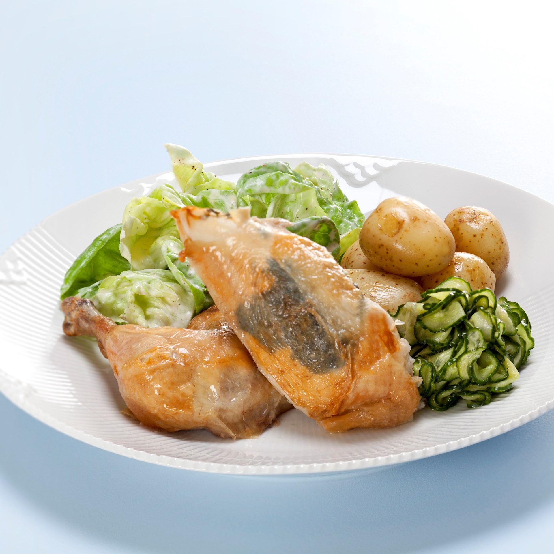 Kylling fyldt med persille og salat se opskriften her